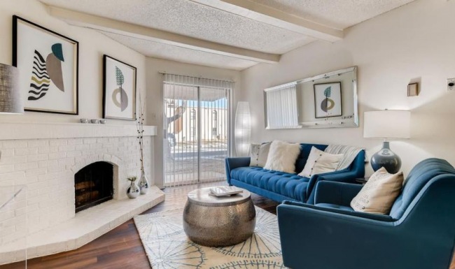 a living room with a fireplace