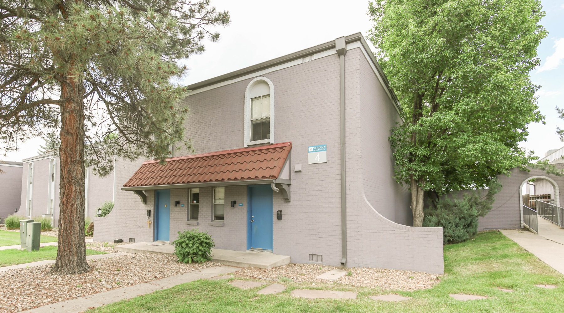 Apartment building exterior with trees